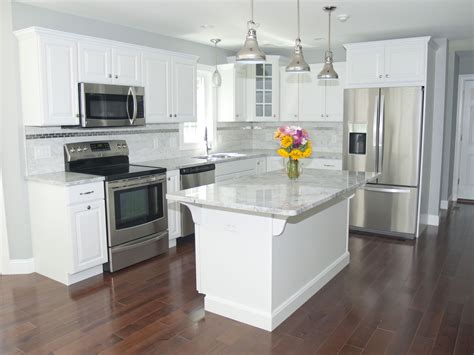 pictures of white kitchen cabinets with stainless steel appliances|white appliances with stainless handles.